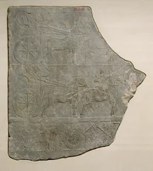 Fragmento de un relieve que representa al ejército asirio en batalla y en descanso, del Palacio de Asurbanipal en Nínive